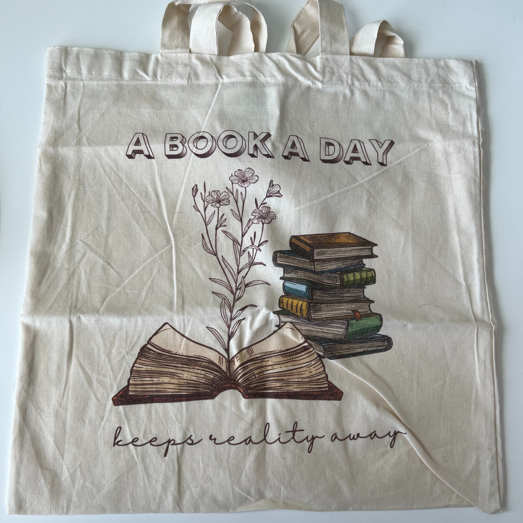 A Book A Day Keeps Reality Away Tote Bag Ella Miles
